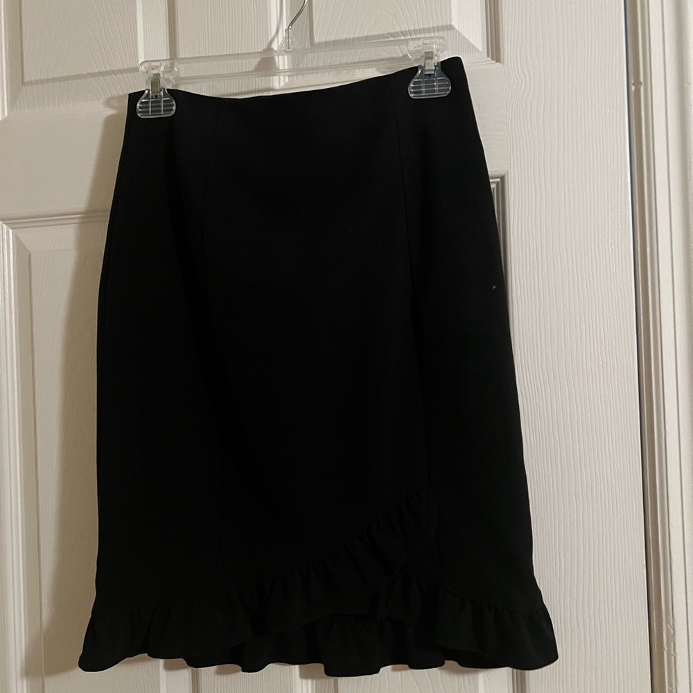 Juniors business skirt with ruffles.